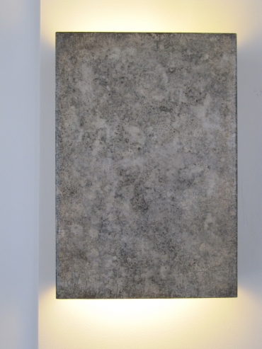 Contemporary etched steel wall light by Hannah Woodhouse. Shanghai steel contemporary wall light is available in two finishes, speckled french grey or dark bronze rust. 