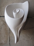 This iconic sculptural shell wall light is the signature piece by artist and lamp maker Hannah Woodhouse. The Graciela shell wall light is available as a wall light, table lamp or sculpture.